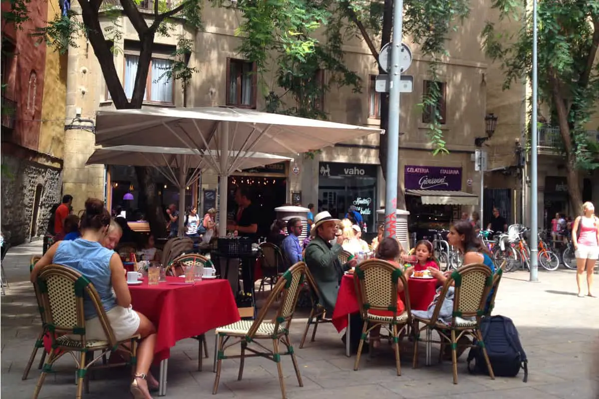 People eating in a square in Barcelona