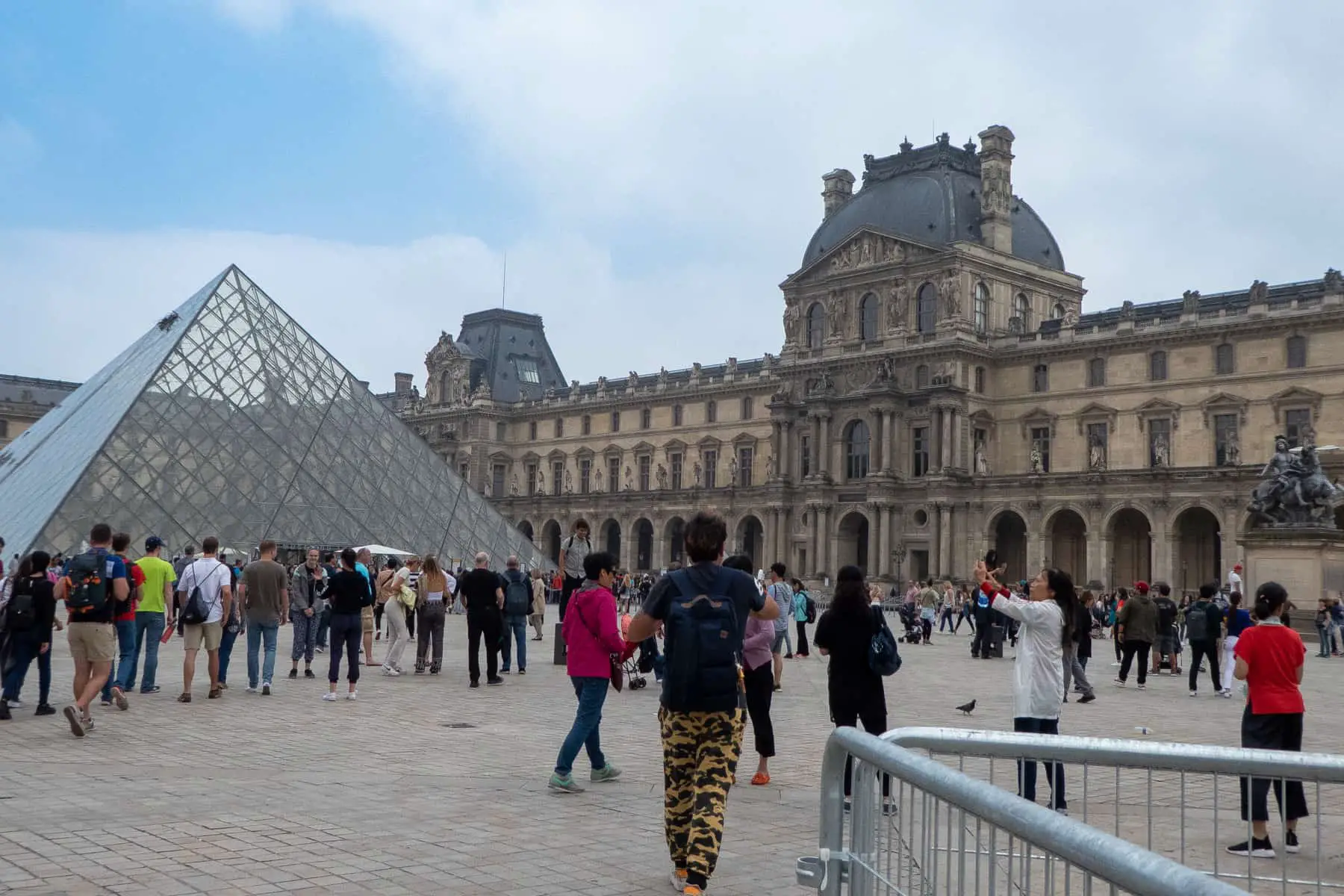 People outside the Louvre